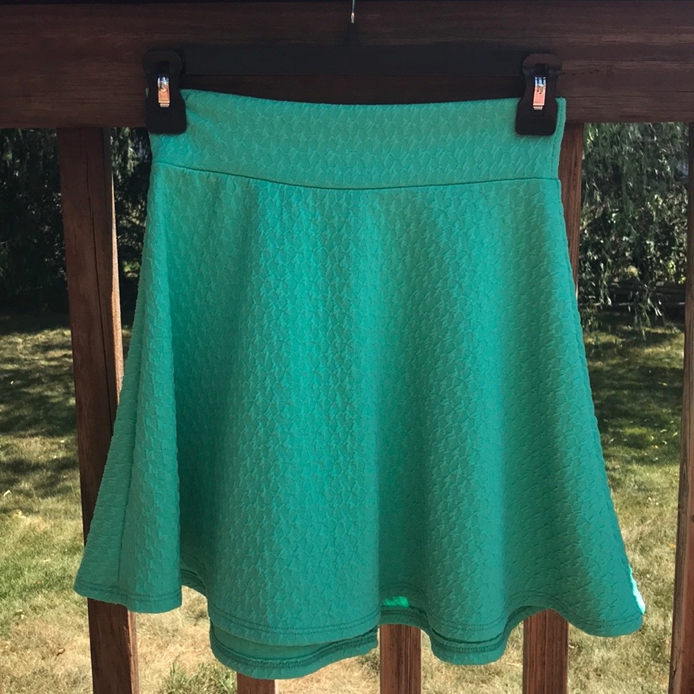Teal circle skirt.